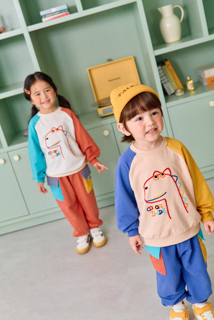 [BLU09] Colored dinosaur raglan T-shirt