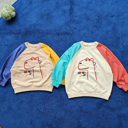 [BLU09] Colored dinosaur raglan T-shirt